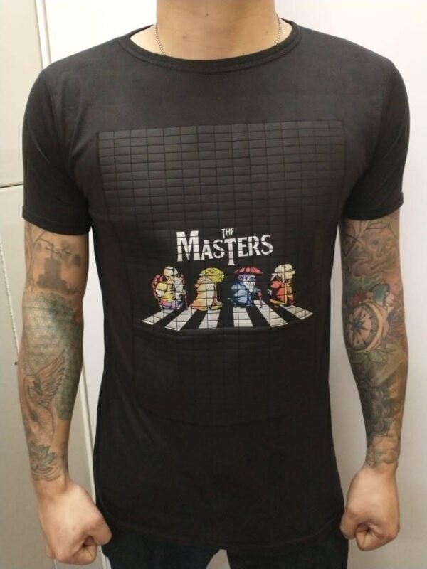 playera negra, con imagen infantil de beatles masters